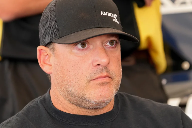 Tony-Stewart-looks-on-during-a-driver-meeting-during-the-Camping-World-Superstar-Racing-Experience-at-Nashville-Fairgrounds-Speedway-on-July-09-2022